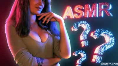 ASMR Airy - a close up of a woman with a question mark on her chest