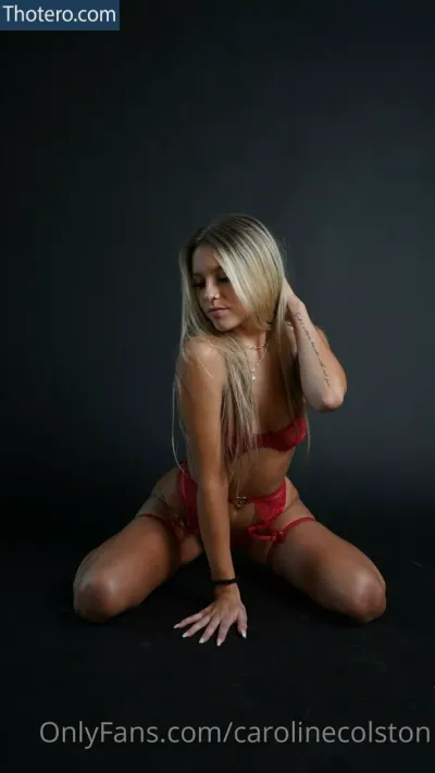 Caroline Colston - woman in red lingerie sitting on the floor
