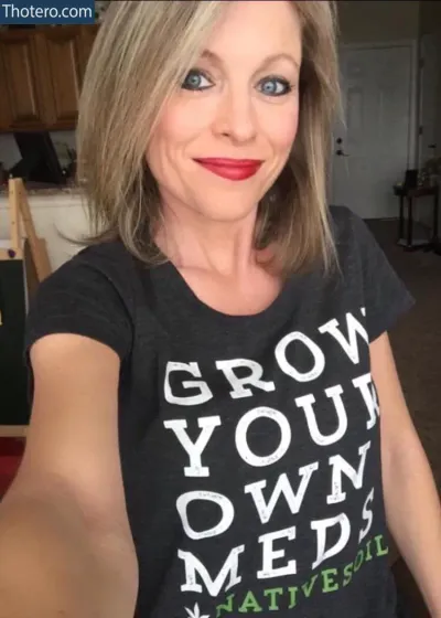 Legalizeitlala - woman with a black shirt that says grow your own medd