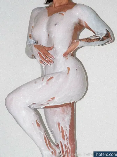 Bugortheletter - woman in white body paint posing for a picture