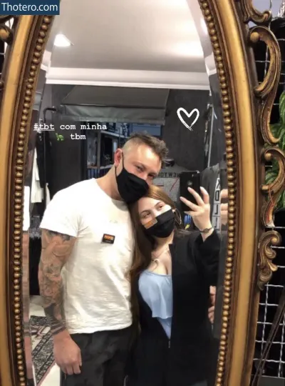 Rafarpvd - man and woman taking a selfie in a mirror