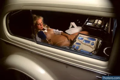 Pamela Jean Bryant - there is a woman in a car with a monitor on her lap