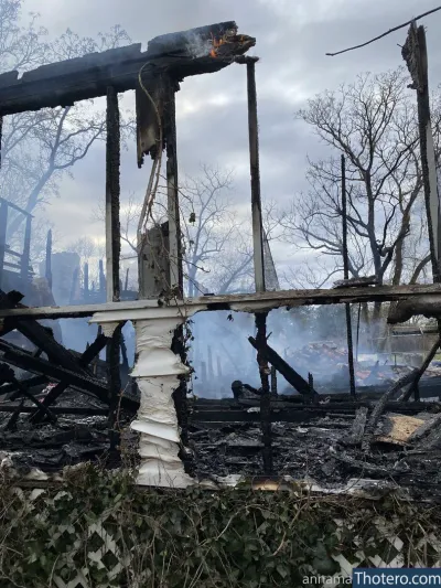 Anna Mathews - a close up of a fire that is burning through a building