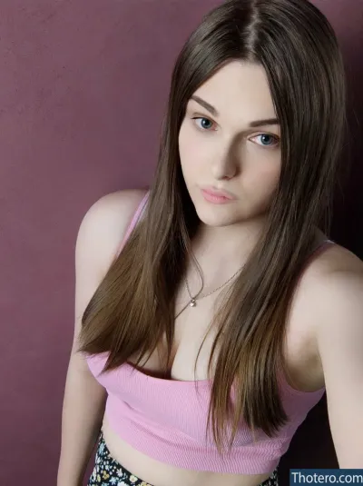 Maddison Swift - woman in a pink top posing for a picture