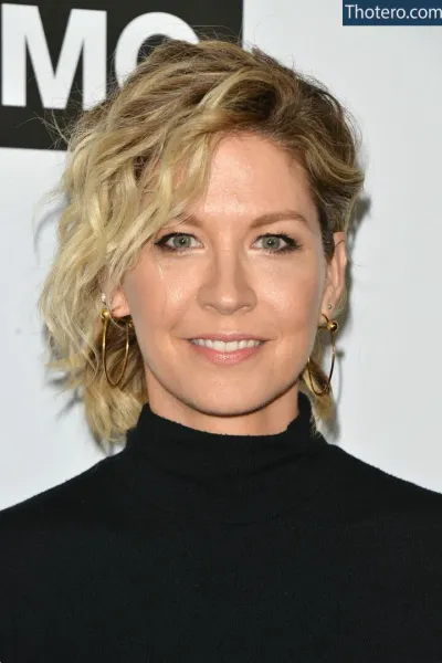 Jenna Elfman - a woman with blonde hair and a black turtle neck top