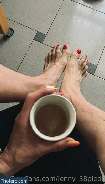 jenny_38piedi - someone is holding a cup of coffee and a pair of feet