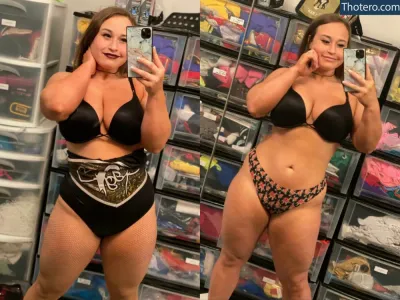 Jordynne Grace - there are two women in a store taking a picture of themselves