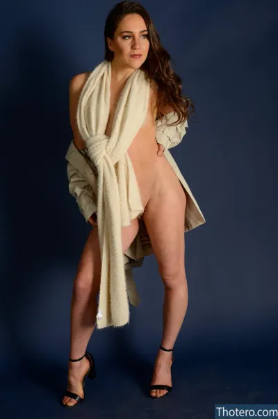 Caroline Cliri - woman in a white shawl posing for a picture