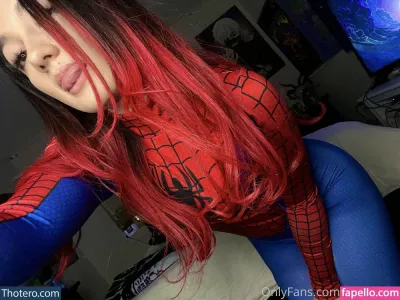 Bxbynai - a close up of a woman with red hair wearing a spider - man costume