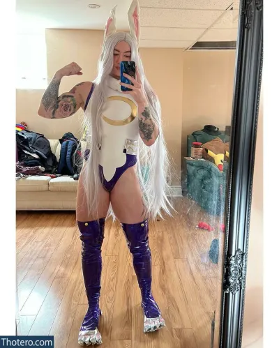 Natasha Aughey - dressed in a costume taking a selfie in a mirror