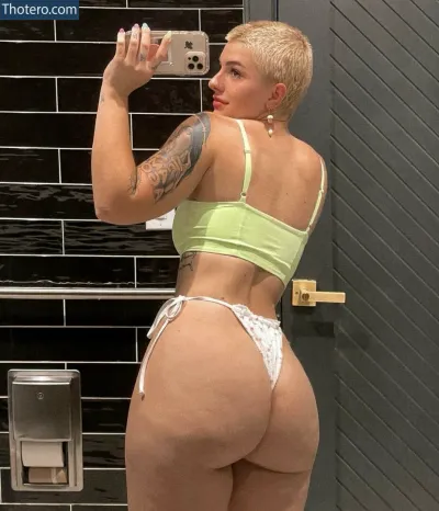 taylorwrenmarie - woman taking a selfie in a bathroom mirror