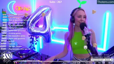 Jessu - image of a woman in a neon green top and headphones