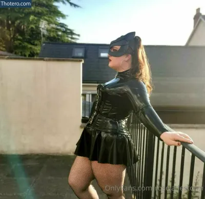 rosejadestorm - woman in a black leather outfit posing on a balcony