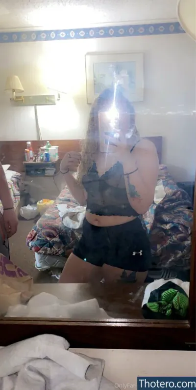 blondiebshortt - there is a woman taking a picture of herself in a mirror