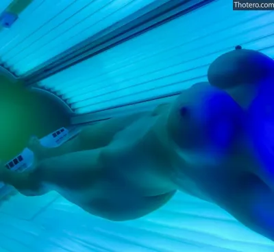 Really Hotwife - there is a naked woman laying in a tanning bed