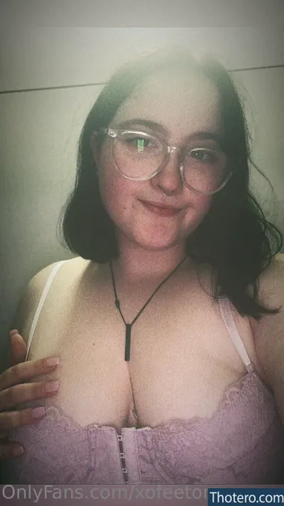 fetishorgasms - there is a woman with glasses and a bra top posing for a picture