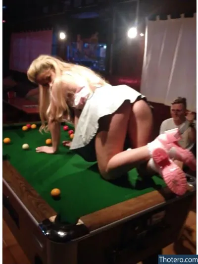 Beckybarbiex - blonde woman in a short skirt playing pool with a stuffed animal