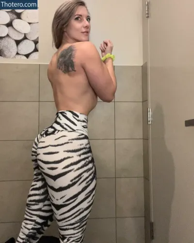 norwegian_liftinggoddess - woman in zebra print pants standing in a bathroom
