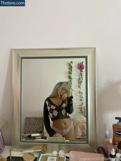 Lila Merlino - woman in underwear taking a selfie in front of a mirror