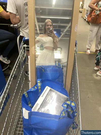 real_tiffany - in a shopping cart with a mirror and a bag