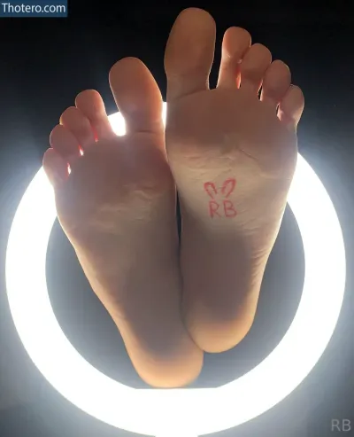 rubybunnyy - there is a person with a tattoo on their foot sitting in a circle