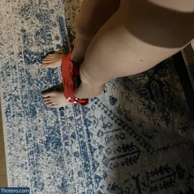 le_lea - someone is standing on a rug with their feet on a pair of sandals