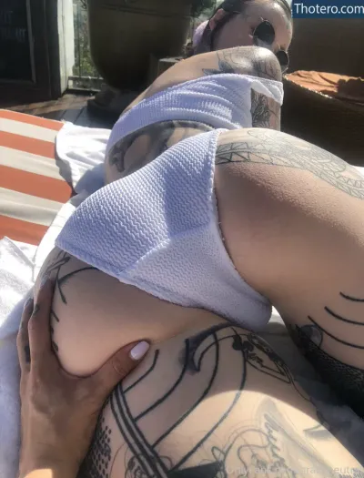 Grace Neutral - woman laying on a bed with a towel on her head