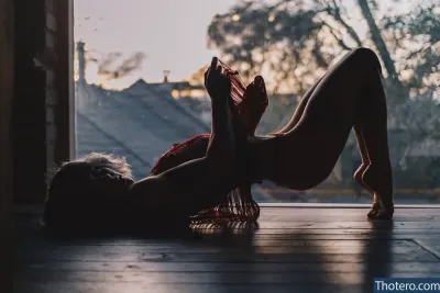 lunaxtreme - woman laying on the floor in front of a window