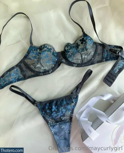 maycurlygirl - a close up of a bra and a pair of underwear on a bed