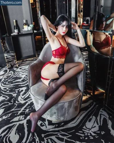 Starlight_h20 - in a red lingerie sitting on a chair in a room