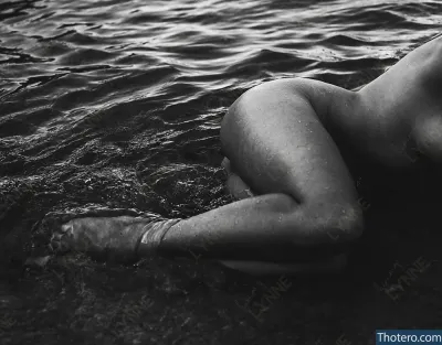Kinky_kimmie - woman laying on the ground in the water