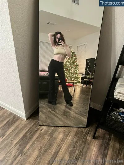 EmiliaNSFW - woman taking a selfie in front of a mirror
