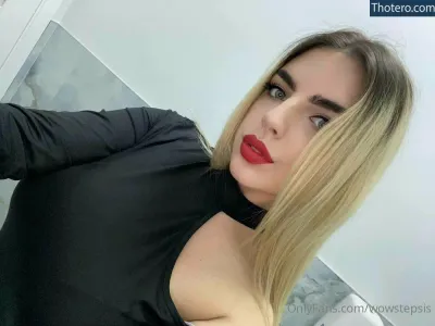 wowstepsis - blond woman with red lips taking selfie in bathroom mirror