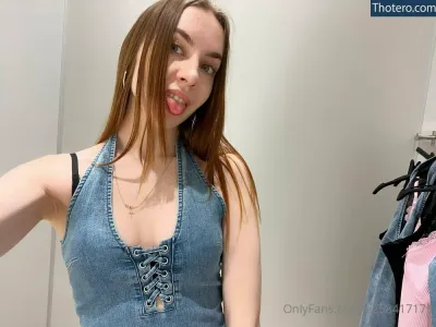 leeeeyyyla - woman in a denim dress taking a selfie in a mirror