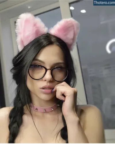 Diana.blaack - woman with glasses and cat ears posing for a picture