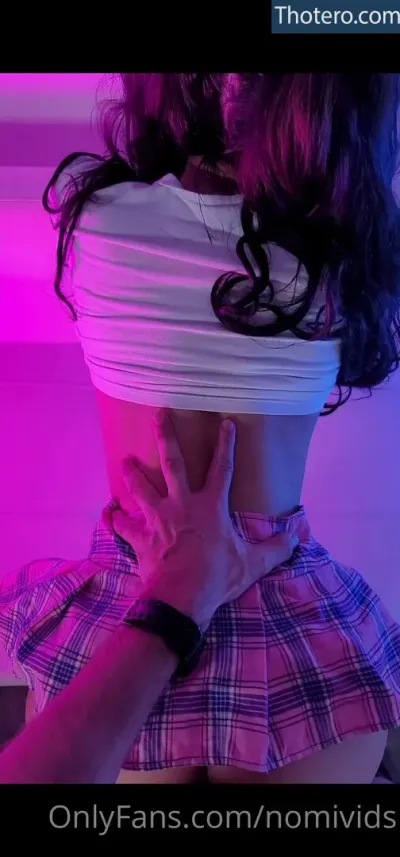 nomicakes - woman covering her face with a white cloth