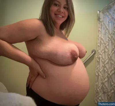 FefeCoco - pregnant woman with large breast posing in bathroom with shower curtain