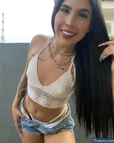 Franciely Ruiz - woman with long black hair posing for a picture