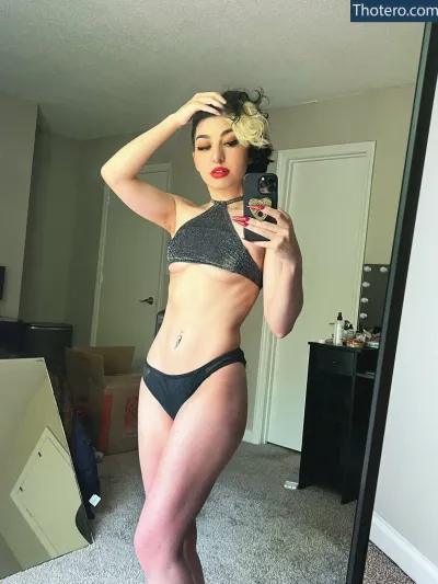 SailorTabbyCat - woman in a bikini taking a selfie in a mirror