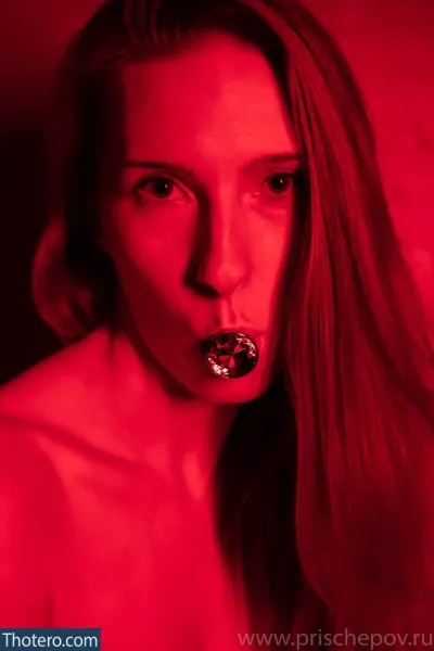 Alina Pokornaya - woman with a black tongue and a red light
