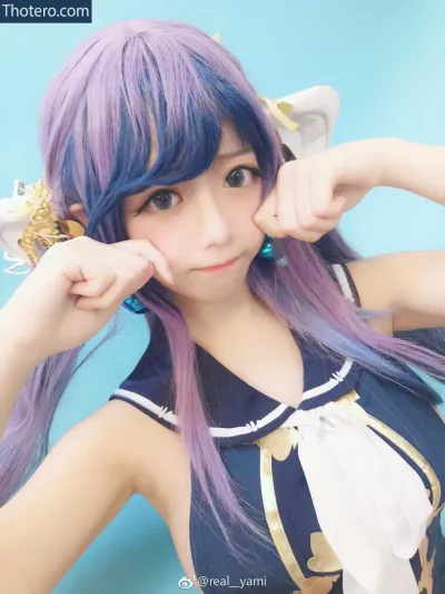 real__yami - image of a woman with purple hair and a blue dress