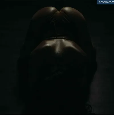 dopeahontas - a close up of a person's butt in a dark room