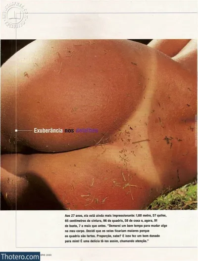 Scheila Carvalho - a close up of a person laying on a grass covered ground