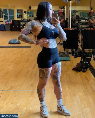 RyderxBurton - woman in a gym with tattoos taking a selfie