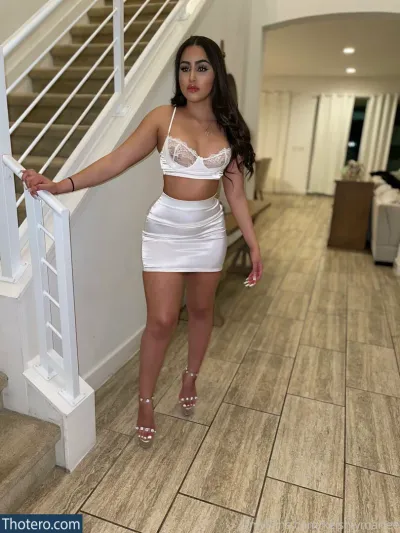 keishlymariee - woman in a white dress standing on a staircase