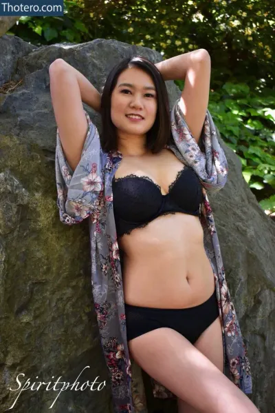 EmiRy - asian woman in a black bra and black panties posing for a picture