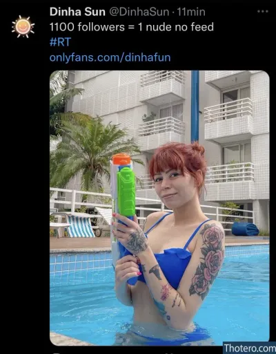 dinhafun - woman in a blue bikini holding a water gun
