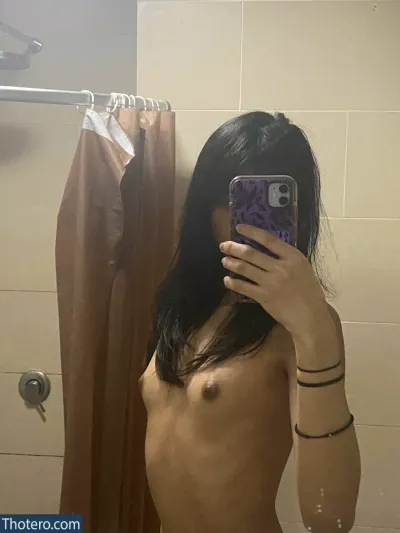 shylidia - woman taking a selfie in a bathroom mirror