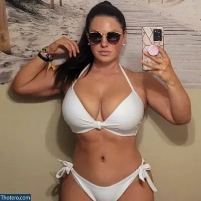 la_girlxx - woman in a white bikini taking a selfie