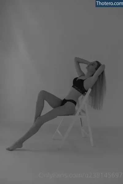 anastayshaa - woman in a black bikini sitting on a chair